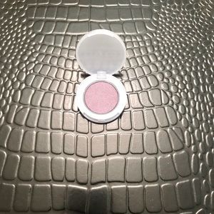 New, unopened  Passport eyeshadow in iridescent purple “Bullet train” color